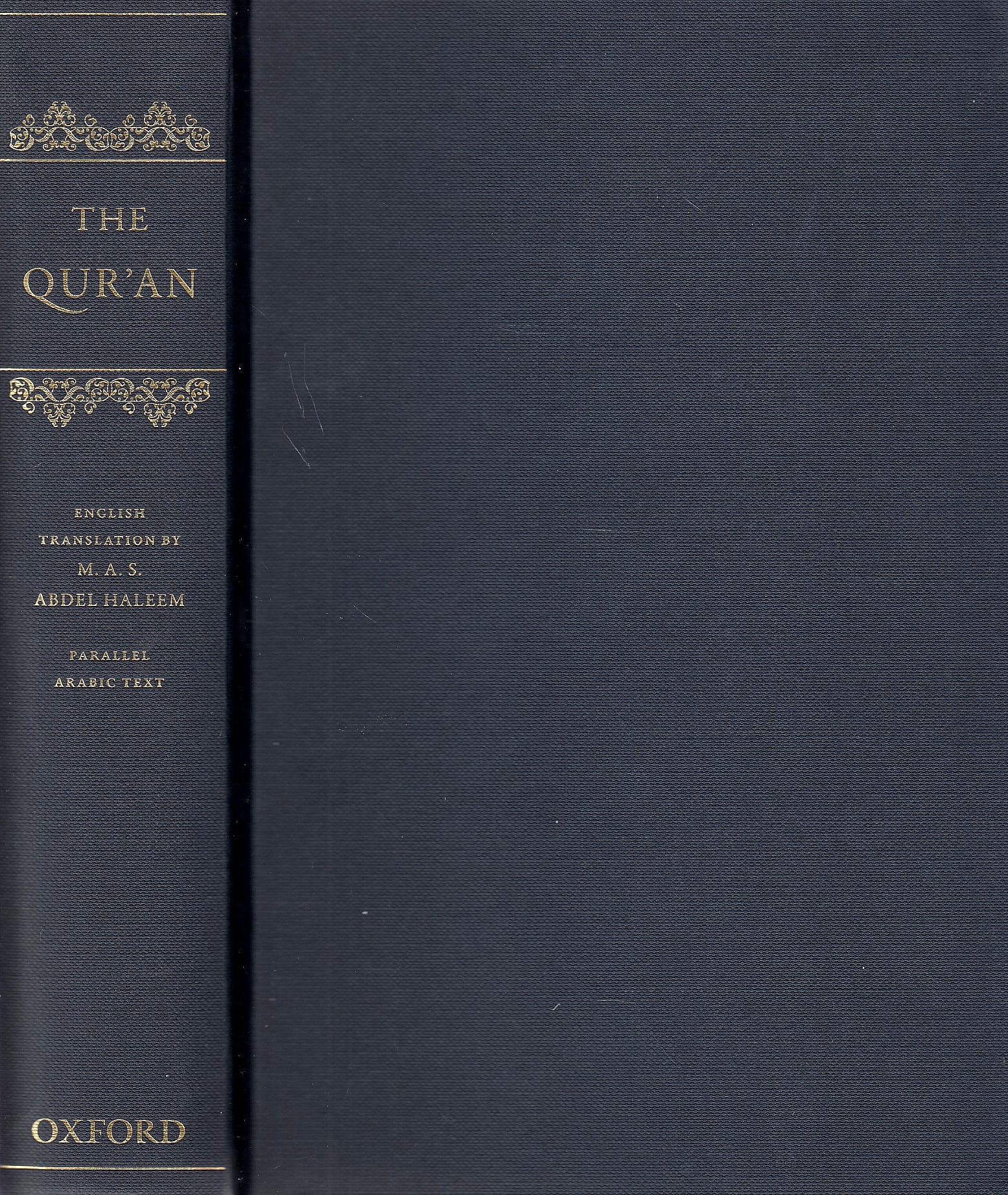 The Qur'an: English translation with parallel Arabic text