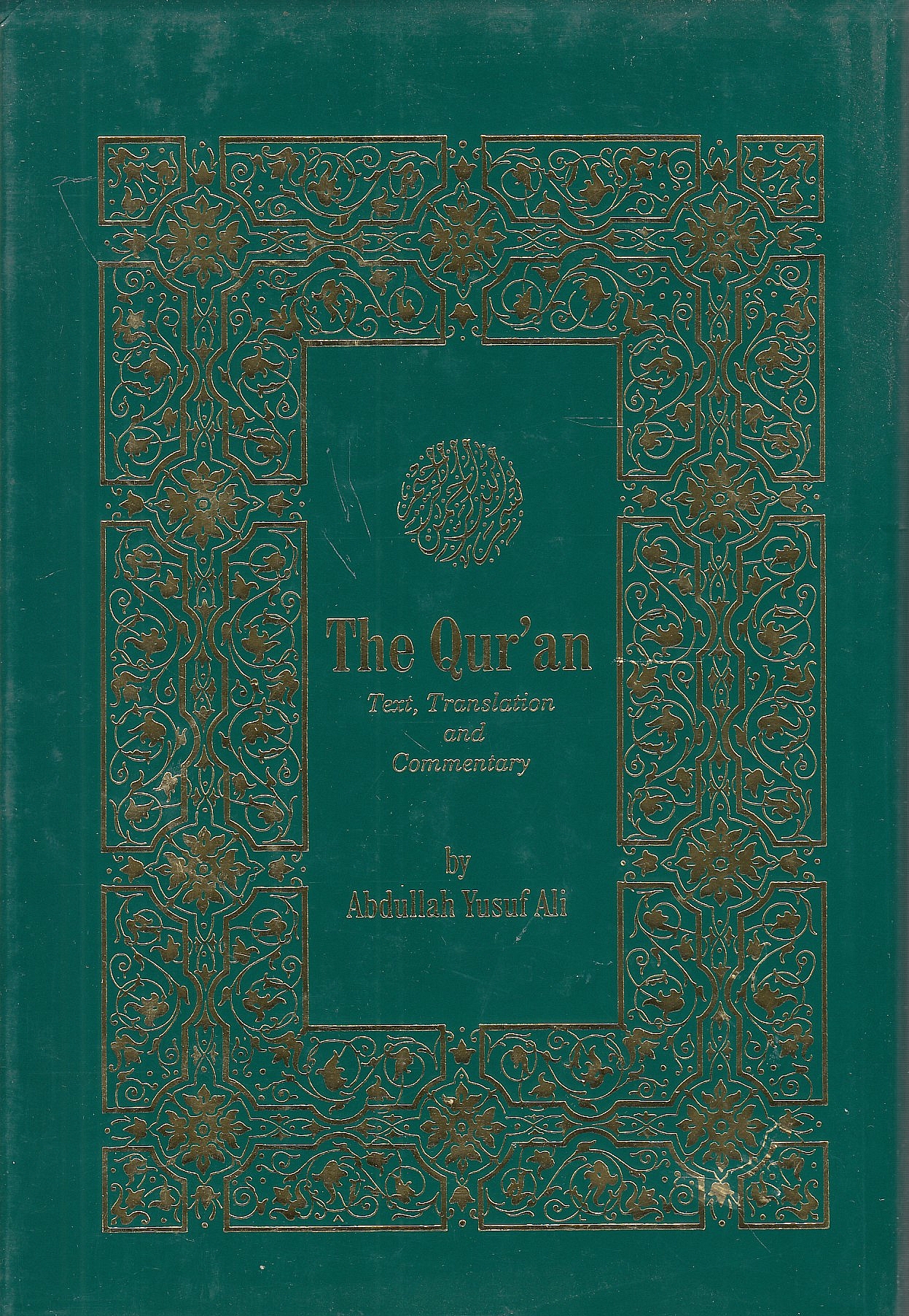 The Holy Qur'an: text, translation and commentary.